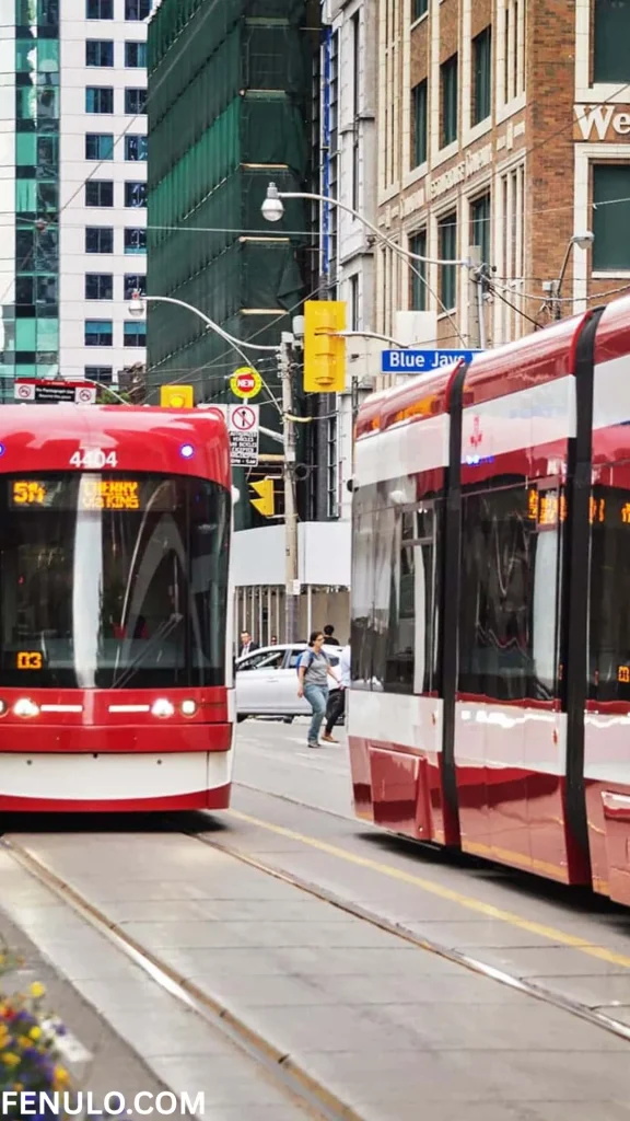 a red buses on a street